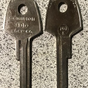 Dominion lock Co uncut key 707K