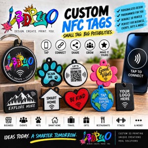 May include: A collection of custom 3D printed NFC tags in various shapes including circles, a paw print, a house, a heart, and a globe. The tags feature text like 'SCAN ME', 'LET'S CONNECT', 'GOOD VIBES', 'BE KIND', and 'TAP TRAVEL EXPLORE'.
