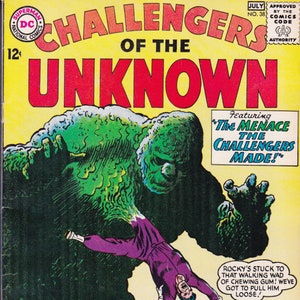 May include: A comic book cover featuring a green monster with three people in purple suits trying to pull it apart. The title of the comic is "Challengers of the Unknown" and the issue number is 38. The text on the cover reads "Featuring "The Menace The Challengers Made!" and "Rocky's stuck to that walking wad of chewing gum! We've got to pull him loose!"