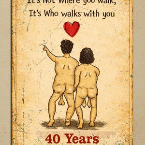 May include: Wooden sign with the text "It's not Where you walk, It's Who walks with you" and "40 Years of Being Awesome Together". The sign features a cartoon illustration of two nude figures and a red heart.