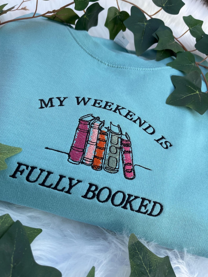 Teal sweatshirt “My Weekend is Fully Booked” embroidered reading design