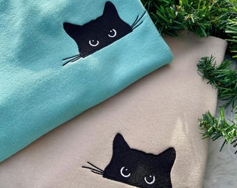 Peeking Black Cat-sweatshirt met geborduurde patchwork