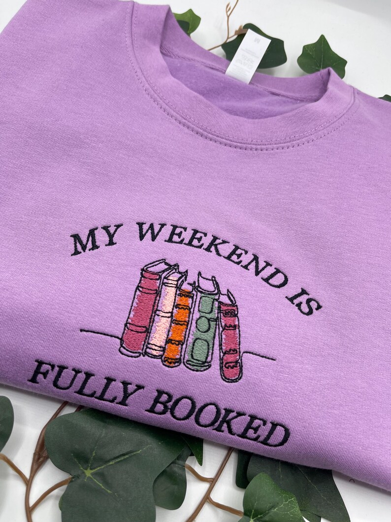 Purple sweatshirt “My Weekend is Fully Booked” embroidery book lover gift