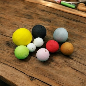 Cotton balls in various sizes and colors, 50 pieces
