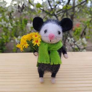 Felt  wool  opossum,  forest beast lying around needles felt