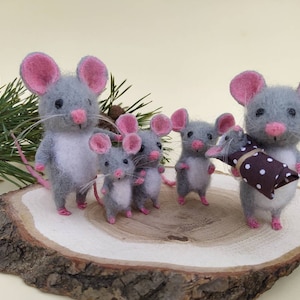 A set of a family of gray felt mice for a dollhouse