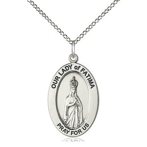 Our Lady of Fatima Sterling Silver Pendant on a 18 inch Sterling Silver Light Curb Chain.