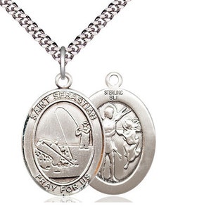 St Sebastian Fishing Sterling Silver Pendant on a 24 inch Light Rhodium Heavy Curb Chain.