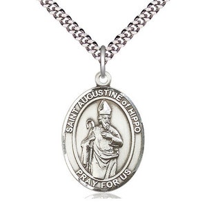 May include: Silver pendant necklace featuring a Saint Augustine of Hippo medal. The medal depicts Saint Augustine in a bishop's robe, holding a book and a staff. The inscription reads "Saint Augustine of Hippo Pray For Us".