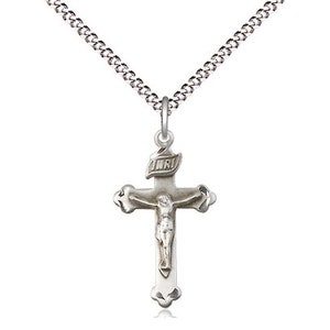 Sterling Silver Crucifix Pendant on a 18 inch Light Rhodium Light Curb Chain.