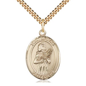 Pendentif Sainte-Agathe sur une chaîne gourmette lourde plaquée or de 61 cm.