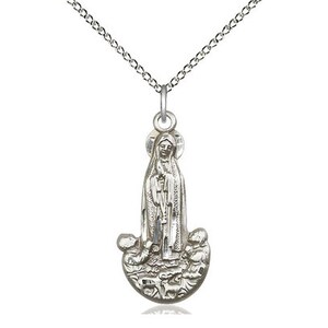 Our Lady of Fatima Sterling Silver Pendant on a 18 inch Sterling Silver Light Curb Chain.