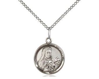 St Theresa Sterling Silver Pendant on a 18 inch Sterling Silver Light Curb Chain.