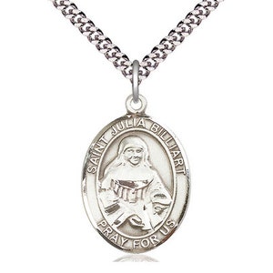 May include: Silver pendant necklace featuring a round oval charm with a depiction of Saint Julia Billiart. The charm has the text "Saint Julia Billiart Pray For Us".