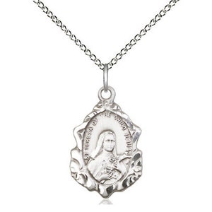 St Theresa Sterling Silver Pendant  on a 18 inch Sterling Silver Light Curb Chain.