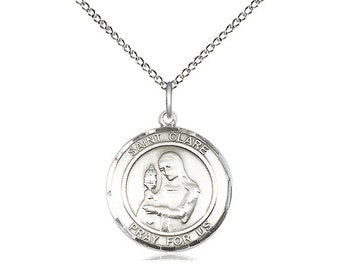 St Clare of Assisi Sterling Silver Pendant on a 18 inch Sterling Silver Light Curb Chain.