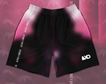 May include: Black athletic shorts with a pink and white gradient design. The shorts have a white logo on the right leg and the text "ALPHA X OMEGA" repeated down the sides.