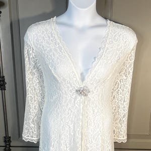 NWOT long stretchy sheer jacket with train Size 18/20