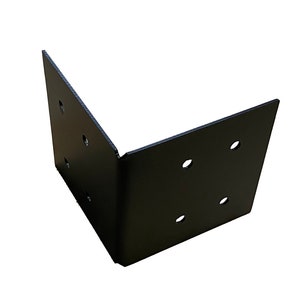 May include: A black, right-angle bracket with multiple pre-drilled holes for mounting. The metal corner brace is designed to reinforce joints in furniture or construction projects. The bracket is shown against a white background.
