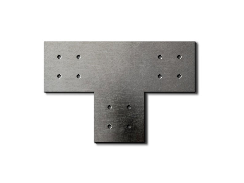 May include: A metal T-shaped bracket with multiple holes for mounting. The bracket is silver in color and has a brushed finish.