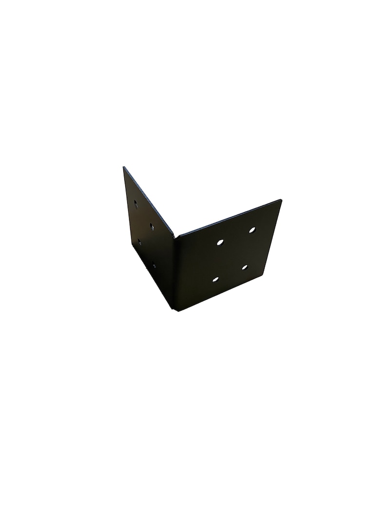 May include: A black, right-angle bracket with multiple pre-drilled holes for mounting. The metal corner brace is designed to reinforce joints in furniture or construction projects. The bracket is shown against a white background.