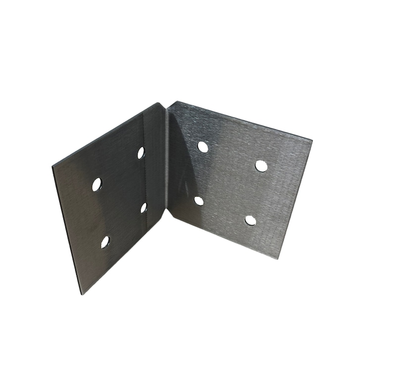 May include: A silver-colored, right-angle bracket made of metal. The bracket has a series of evenly spaced holes for mounting. The two perpendicular sides are joined at a 90-degree angle. The bracket is designed for structural support.