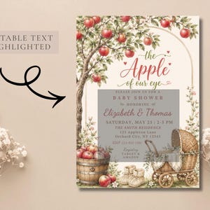May include: A rectangular baby shower invitation card featuring an apple tree illustration, a wooden barrel filled with red apples, a wicker baby carriage, and baby booties. The text reads: The Apple of our eye, Baby Shower, Elizabeth & Thomas.