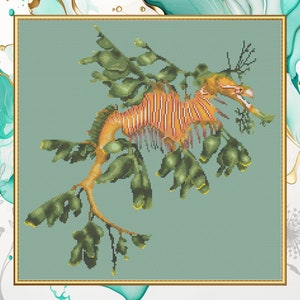 May include: A cross-stitch pattern of a seahorse with leafy appendages, on a light blue background. The seahorse is orange and white, with green leaves.
