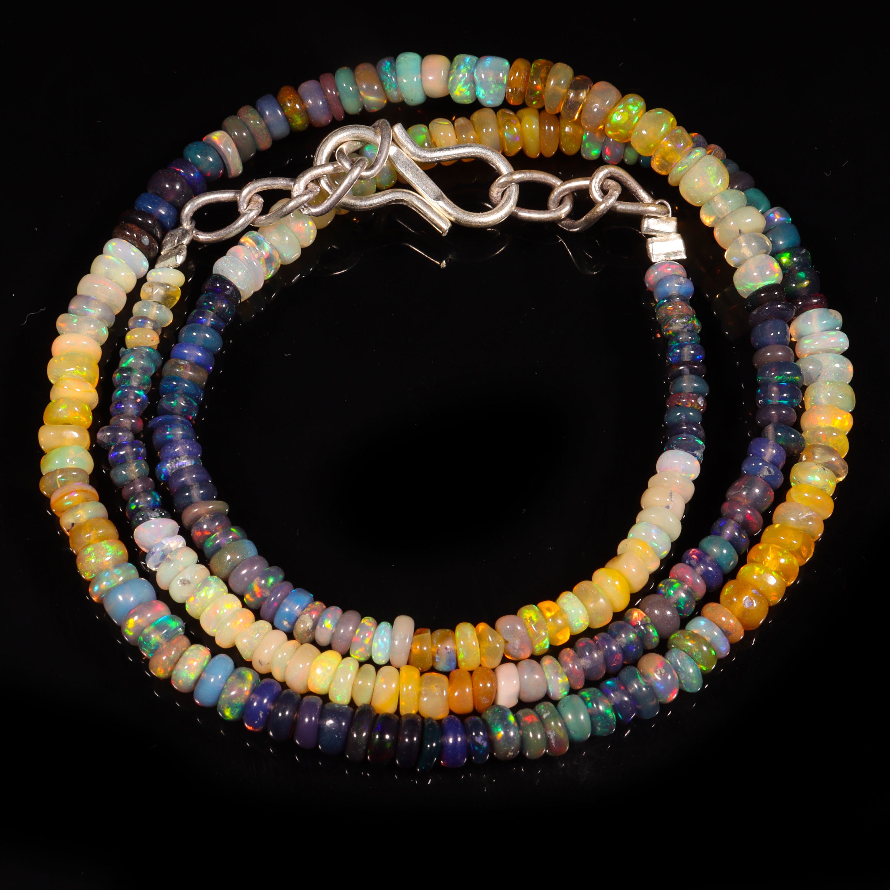 22.90カラット天然エチオピア産ウェロファイアブラックスムース