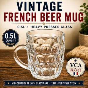 May include: Clear, vintage French beer mug with a 0.5L capacity. The heavy pressed glass mug has a handle and a textured pattern. The text on the mug reads "VINTAGE FRENCH BEER MUG".