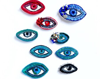 Embroidered eyes, ex-voto eye, embroidered eyes and beads