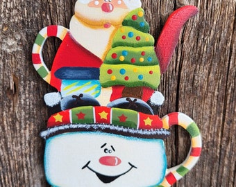 Festive Santa in a Snowman Mug Ornament