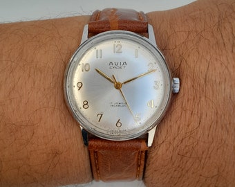 Reloj vintage Avia Cadet para hombre 17 joyas mecánico (cuerda manual) hecho en Suiza