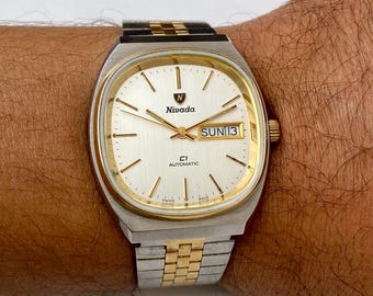 Vintage NIVADA C1 Automatic Watch: Day Date Dial, Swiss Made
