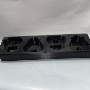 Milwaukee M 12 battery holder.