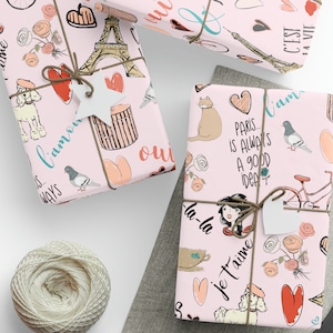 a pair of scissors, a ball of twine, and some wrapping paper