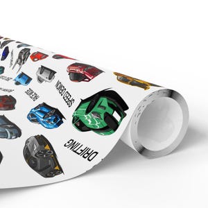 a close up of a roll of paper with cars on it