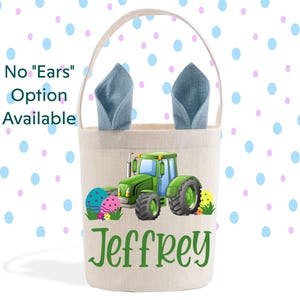 May include: A green and black toy tractor with a personalized name "Jeffrey" on a beige canvas Easter basket with blue bunny ears. The basket is on a white background with blue and pink polka dots.