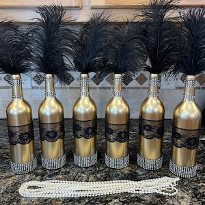 Great gatsby roaring 20's speakeasy party. Ostrich feather centerpieces,  art deco …