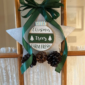 Star Shaped Sign with Ornament, Pinecone, and Bow Accents