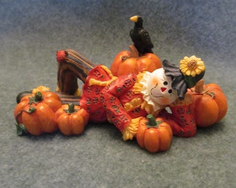 This Cute Scarecrow is Lounging With 5 Pumpkins, He is Resin and is From 1997, Marked THT on the Back, Don't Forget the Sunflower & Crow