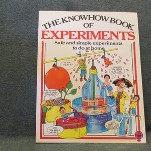 May include: A colorful book cover with the title "The Knowhow Book of Experiments". The cover features illustrations of children performing science experiments, including a bottle fountain, a plant growing upwards, and a balloon being lifted by air.