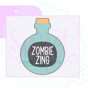 May include: A teal-colored potion bottle cookie cutter with a brown cork and the words "ZOMBIE ZING" in white on a dark gray oval. The design is set against a light gray background with a pink and purple border.
