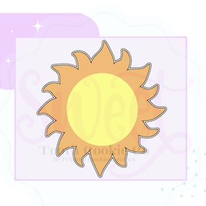 May include: A cookie cutter shaped like a sun with a yellow center and orange rays. The cutter is made of metal and has a smooth finish.