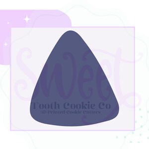 May include: A dark blue 3D printed cookie cutter shaped like a triangle with rounded edges. The cutter is for making cookies in the shape of a candy. The text "Tooth Cookie Co. 3D Printed Cookie Cutters" is printed on the cutter.