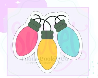 May include: Three Christmas lights in a string, pink, yellow, and blue, with a white outline.