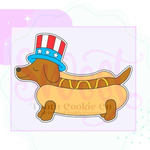 May include: A cartoon illustration of a dachshund wearing a patriotic Uncle Sam hat, inside a hot dog bun. The hot dog has a mustard filling. The image is outlined in black and set against a light purple background.