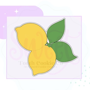 May include: A cookie cutter in the shape of two lemons with green leaves. The cookie cutter is made of metal and is designed for baking.