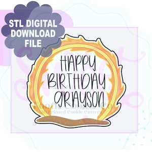 May include: A digital download file for a cookie cutter in the shape of a ring of fire with the text "Happy Birthday Grayson" inside.