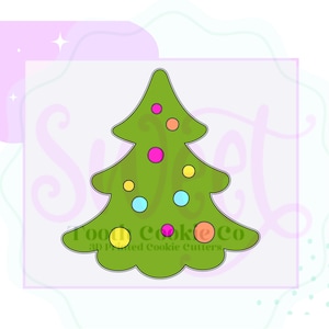 May include: Green Christmas tree cookie cutter with a scalloped bottom edge and colorful circle decorations.  The text "Food Cookie Co. 3D Printed Cookie Cutters" is at the bottom of the cutter.